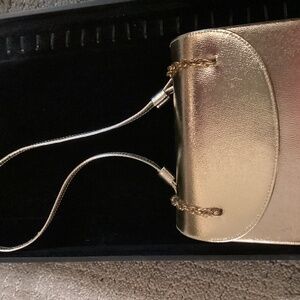 Gold small dress bag with matching strap